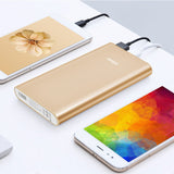 12000mAh Power Bank connected to two smartphones, showcasing its portable design and charging efficiency.